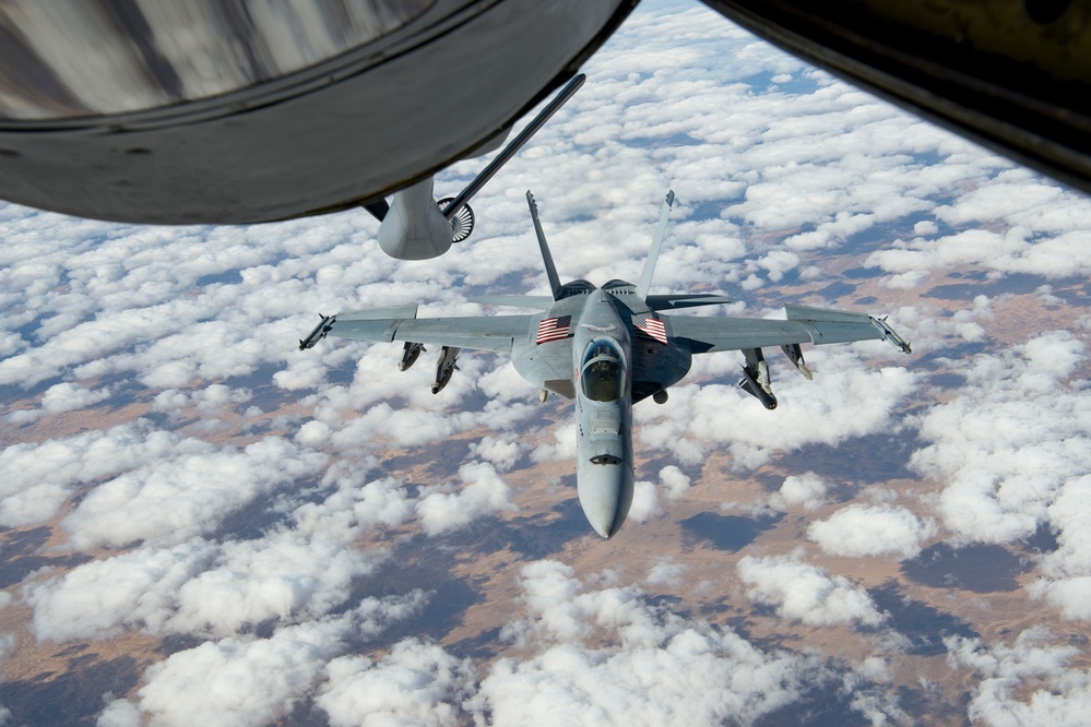 A U.S. Air Force KC-135 aircrew assigned to the 28th Expeditionary Air Refueling Squadron conducts aerial refueling over Afghanistan.