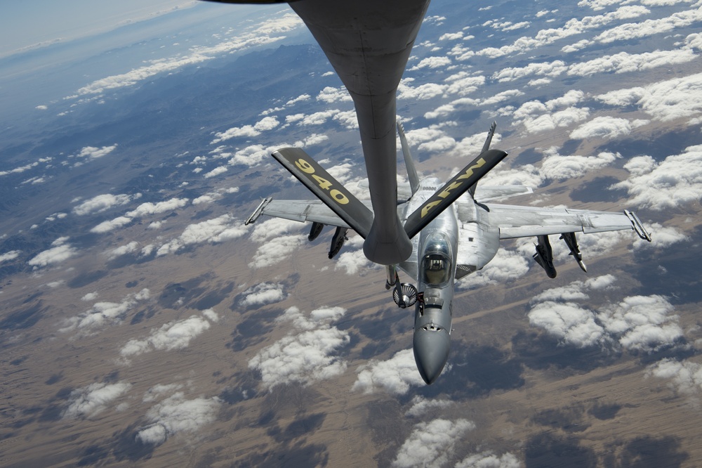 A U.S. Air Force KC-135 aircrew assigned to the 28th Expeditionary Air Refueling Squadron conducts aerial refueling over Afghanistan.