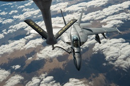 A U.S. Air Force KC-135 aircrew assigned to the 28th Expeditionary Air Refueling Squadron conducts aerial refueling over Afghanistan.
