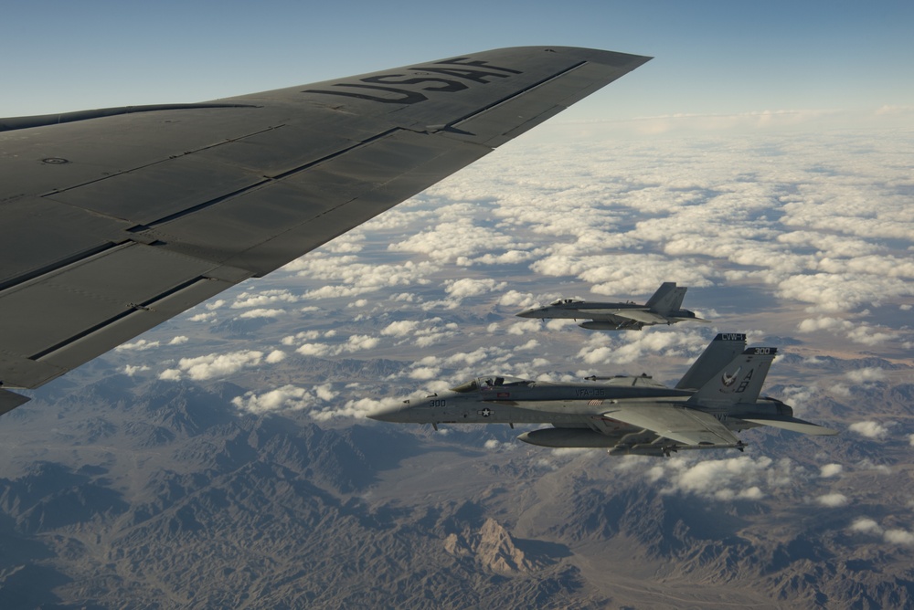 A U.S. Air Force KC-135 aircrew assigned to the 28th Expeditionary Air Refueling Squadron conducts aerial refueling over Afghanistan.