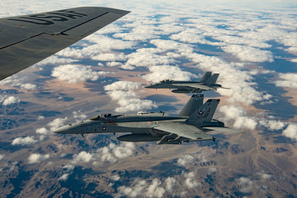 A U.S. Air Force KC-135 aircrew assigned to the 28th Expeditionary Air Refueling Squadron conducts aerial refueling over Afghanistan.