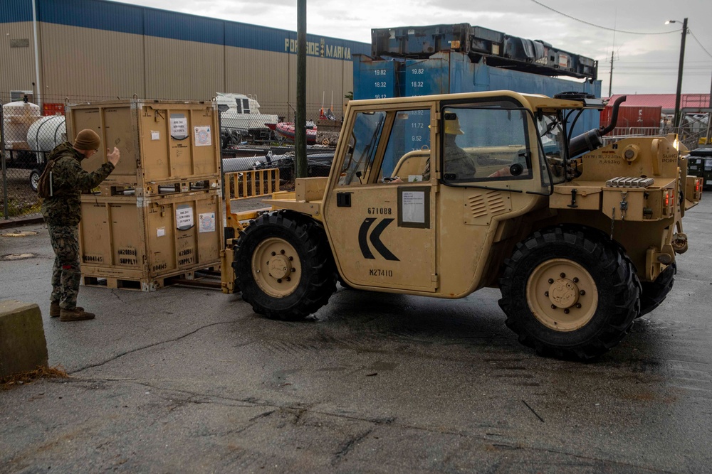 Marines move cargo aboard New York