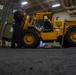 Sailors move cargo in the well deck of New York