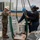 Sailors and Marines unload cargo