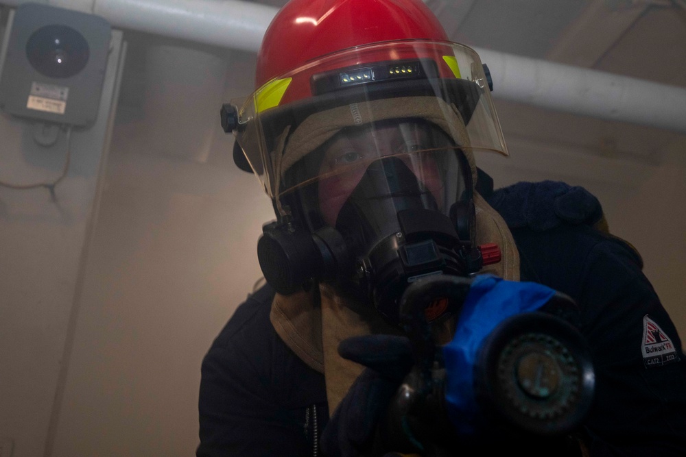 Sailor fights a simulated fire