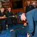 USS Normandy Sailor Gives First Aid Training