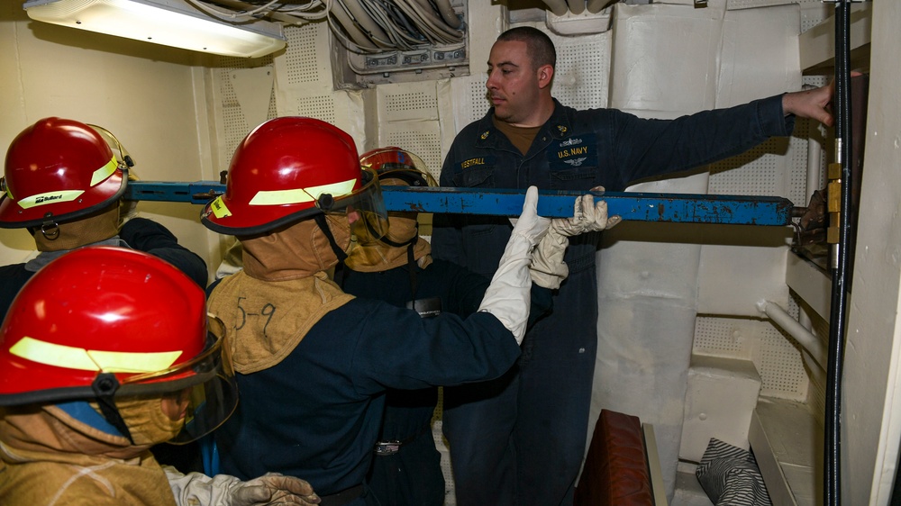 USS Normandy Sailors Erect Shoring