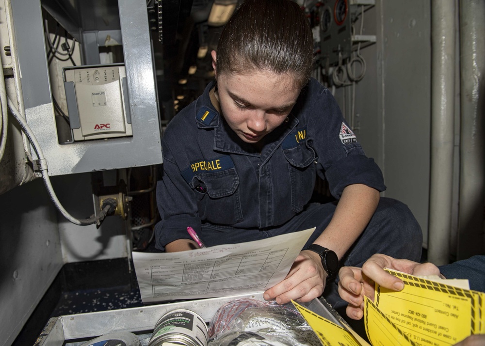 USS Normandy Sailor Inventories Hazardous Materials Spill Kit