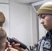 Marine cuts hair