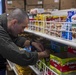 Sailors work in the ship store