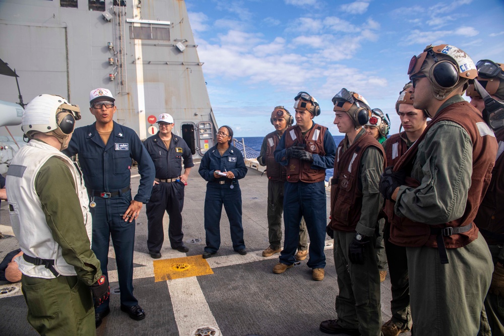 Sailors take part in flight deck fire fighting