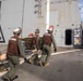 Sailors take part in flight deck fire fighting