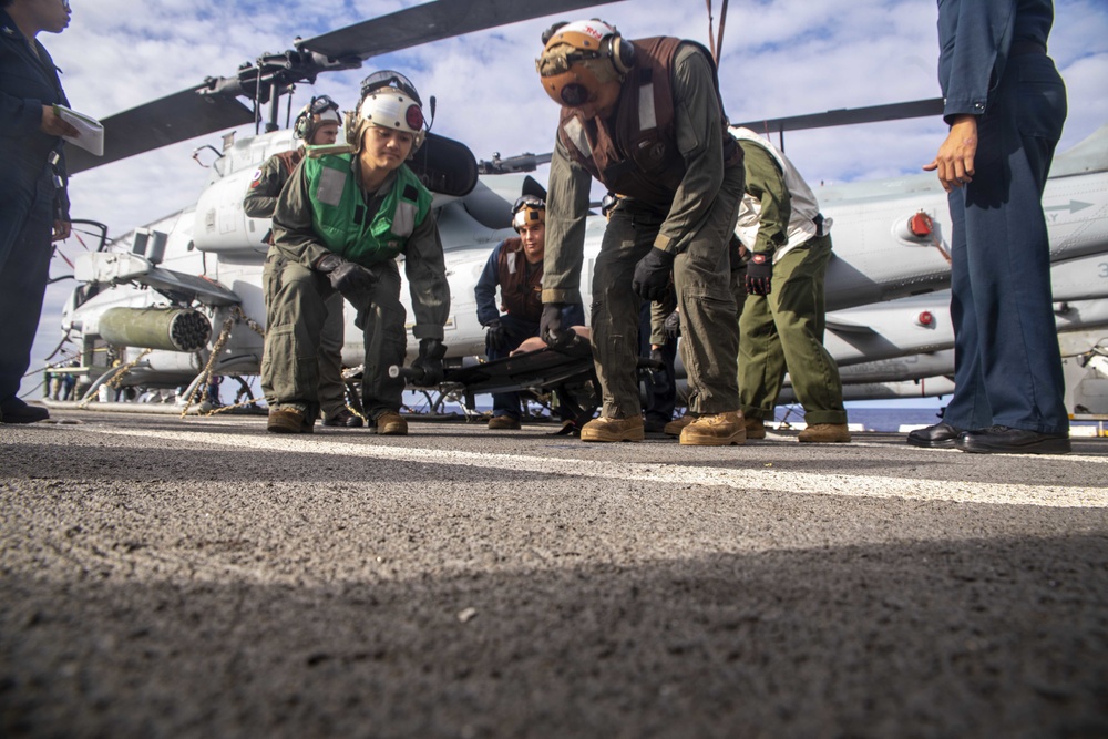 Sailors take part in flight deck fire fighting