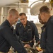 Sailors treat a simulated casualty