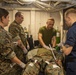 Sailors and Marines treat a simulated casualty