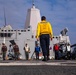 Sailors and Marines perform FOD walkdown.