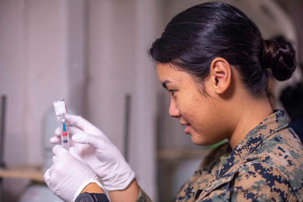 Corpsman fill syringe