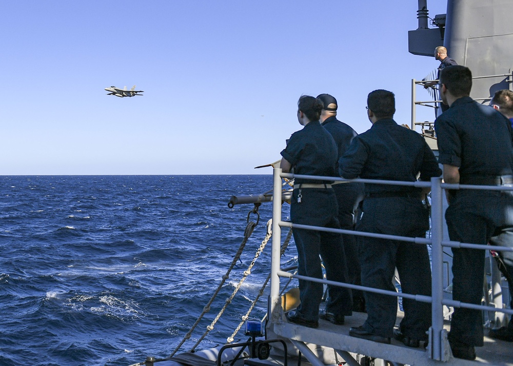 F/A-18F Super Hornet Flies By USS Normandy