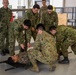 Iron Fist 2020: US Sailors with 1st Medical Battalion demonstrate casualty evacuation procedures to Japan Ground Self-Defense Force soldiers.
