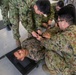 Iron Fist 2020: US Sailors with 1st Medical Battalion demonstrate casualty evacuation procedures to Japan Ground Self-Defense Force soldiers.
