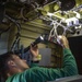 USS Normandy Sailor Reattaches Flight Control Cables on MH-60R