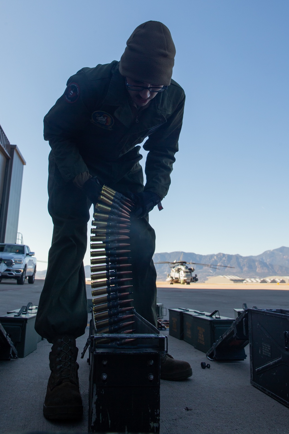 HMH-461 Marines shoot M2 machine guns and externally lift Humvees