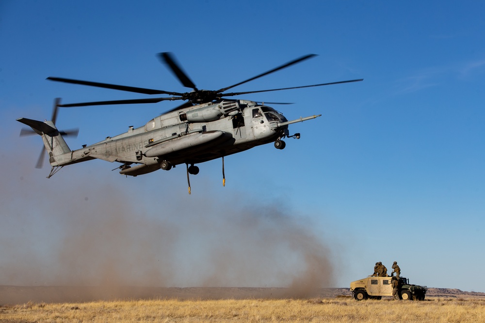 HMH-461 Marines shoot M2 machine guns and externally lift Humvees