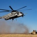 HMH-461 Marines shoot M2 machine guns and externally lift Humvees