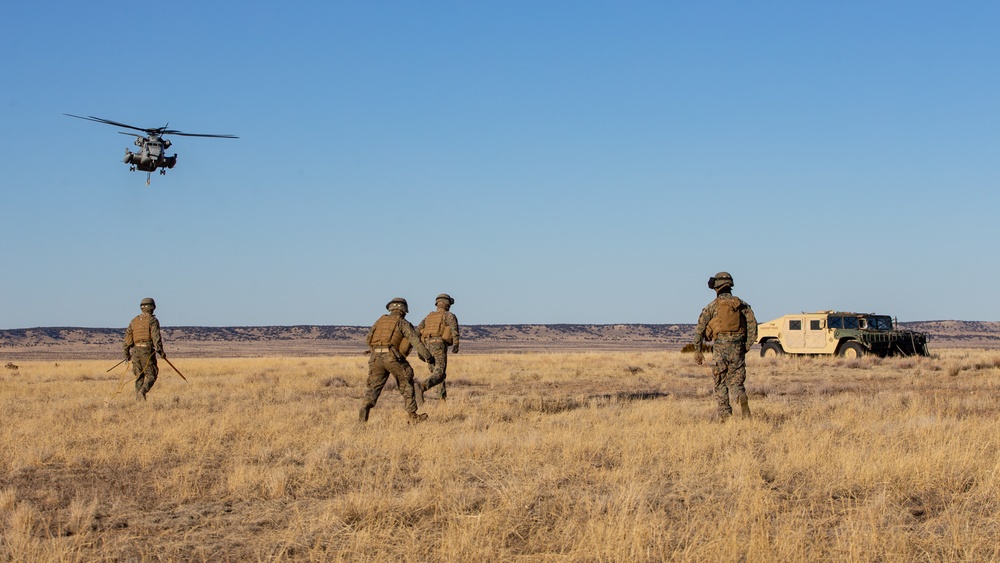 HMH-461 Marines shoot M2 machine guns and externally lift Humvees