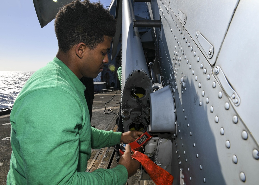 USS Normandy Sailor Folds Stabilator