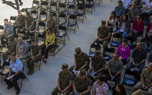 BEQ Untying Maile Lei ceremony