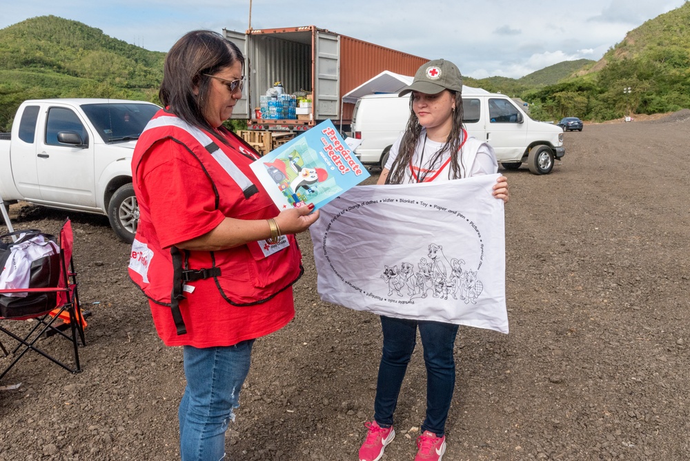 Red Cross at Community Camp for Quake Survivors