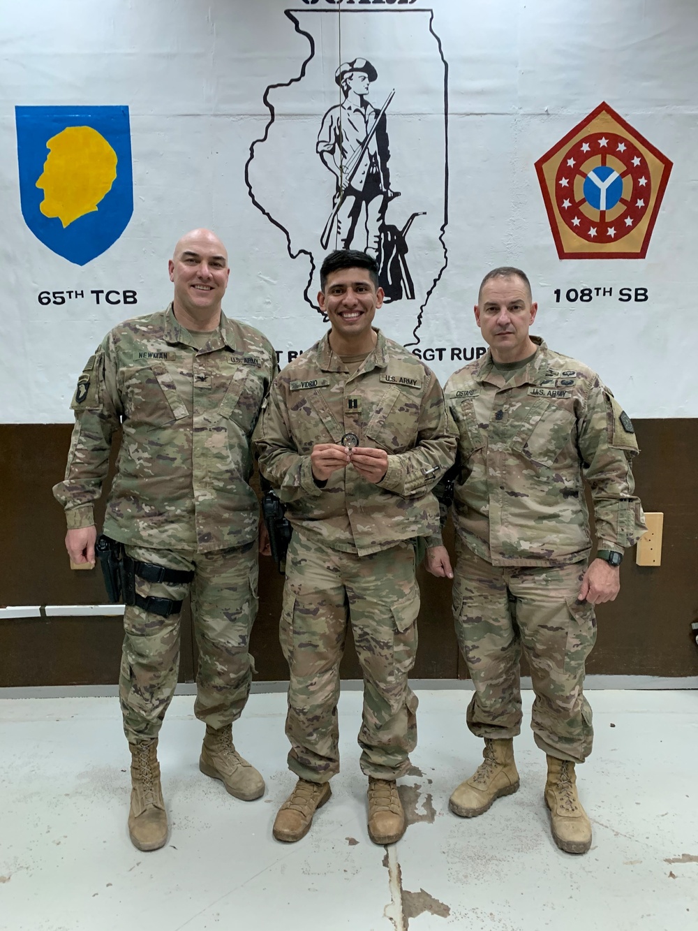 Deployed Illinois Soldiers awarded the Commander’s Coin of Excellence