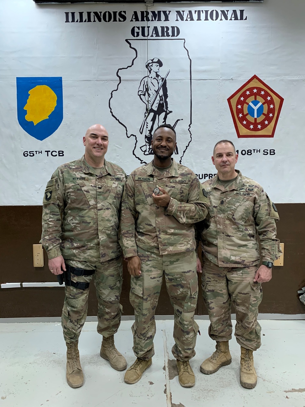 Deployed Illinois Soldiers awarded the Commander’s Coin of Excellence