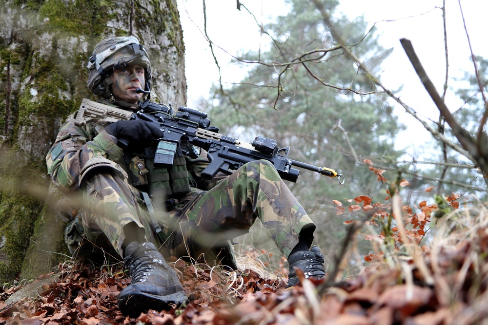 Camouflaged Dutch Soldier ready for Combined Resolve XIII exercise