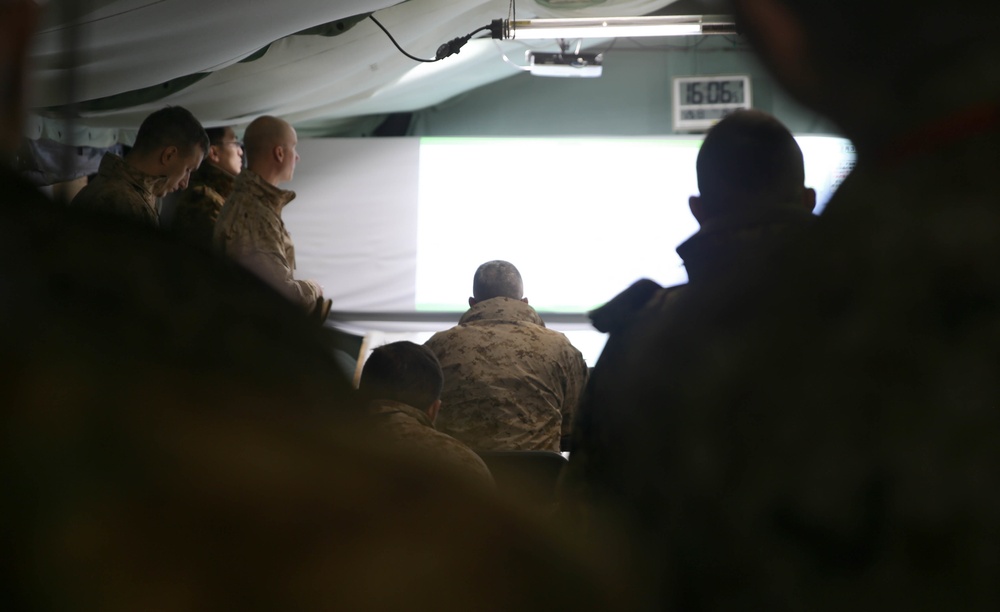 U.S Marines from 4th Marine Regiment Command Staff and Soldiers from JGSDF take part in a planning meeting during Northern Viper  2020