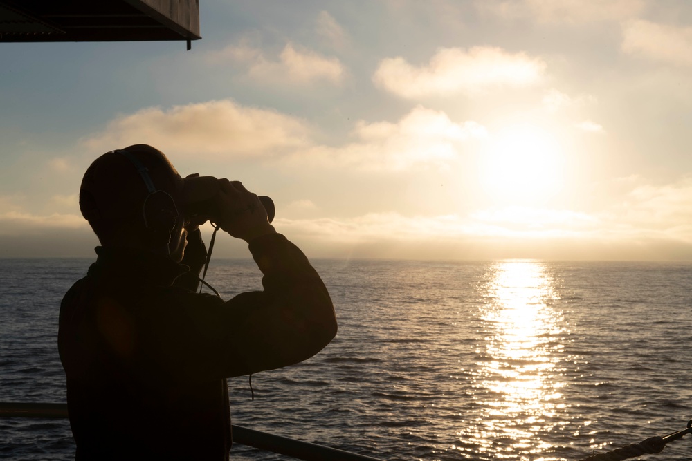 Sailor stands watch aboard USS Nimitz (CVN 68)