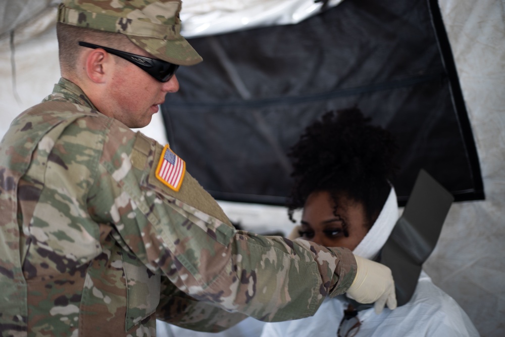 Soldier of 546th Area Support Medical Company treats role player