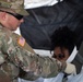 Soldier of 546th Area Support Medical Company treats role player