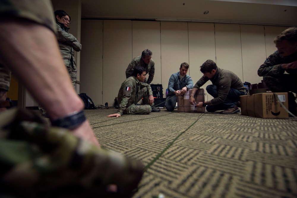 Combat Aviation Advisors teach French Air Force members at Emerald Warrior 20-1