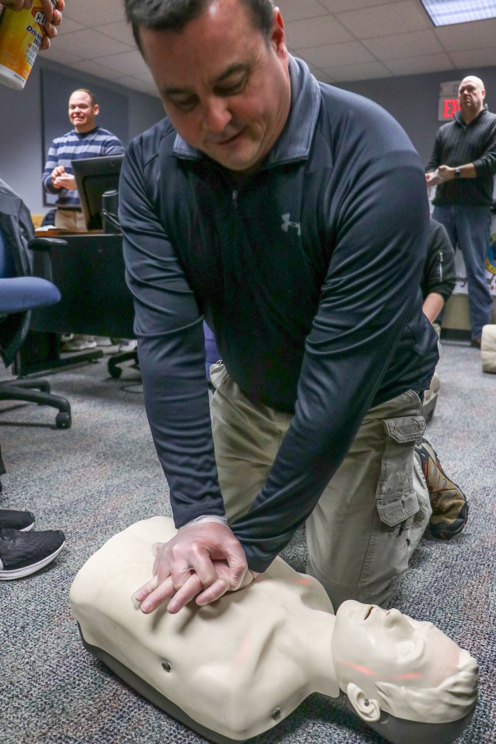 Student practices CPR