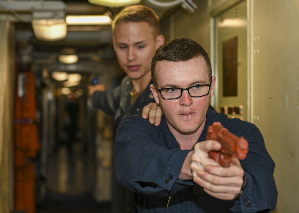 USS Normandy Sailors Execute Tactical Movements During Security Reaction Force Training