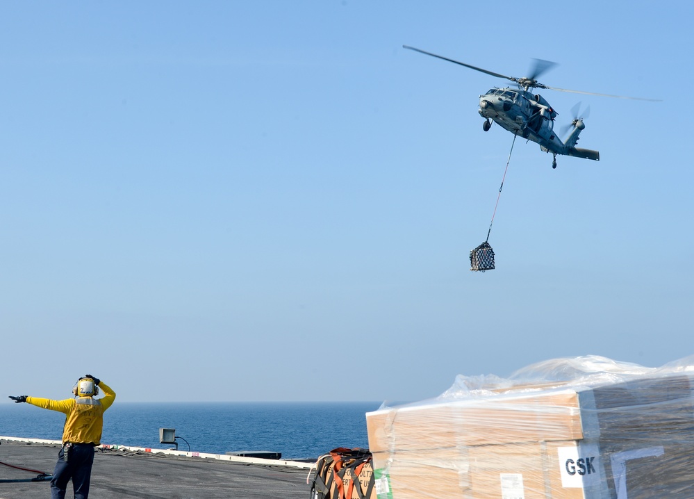 USS Harry S. Truman (CVN 75) conducts a replenishment-at-sea in the Arabian Sea