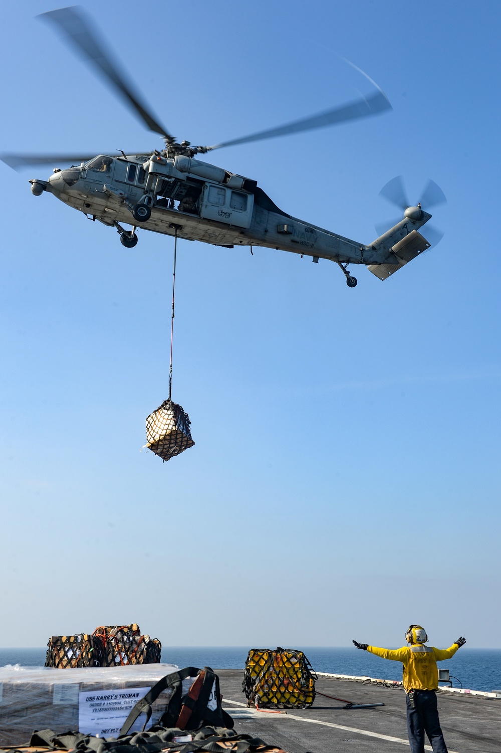 USS Harry S. Truman (CVN 75) conducts a replenishment-at-sea in the Arabian Sea