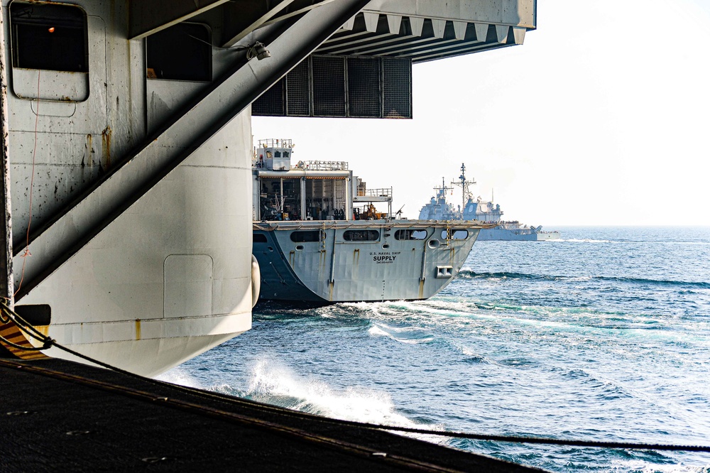 USS Harry S. Truman (CVN 75) conducts a replenishment-at-sea in the Arabian Sea