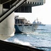 USS Harry S. Truman (CVN 75) conducts a replenishment-at-sea in the Arabian Sea