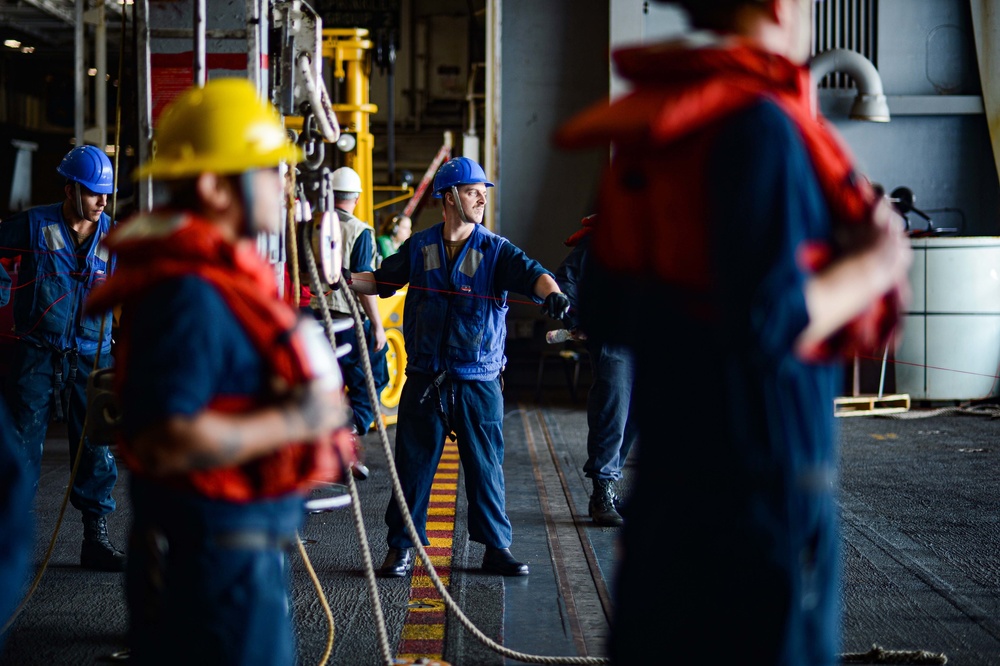 USS Harry S. Truman (CVN 75) conducts a replenishment-at-sea in the Arabian Sea