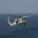 USS Harry S. Truman (CVN 75) conducts a replenishment-at-sea in the Arabian Sea