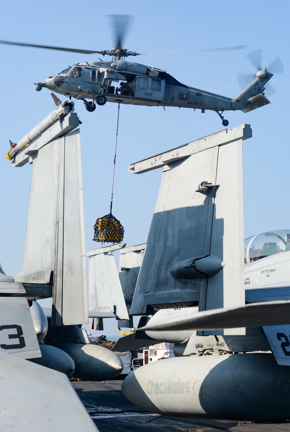 USS Harry S. Truman (CVN 75) conducts a replenishment-at-sea in the Arabian Sea