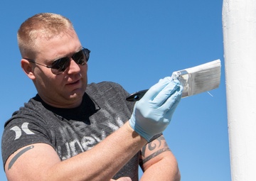 325th Maintenance Squadron restores school flag pole